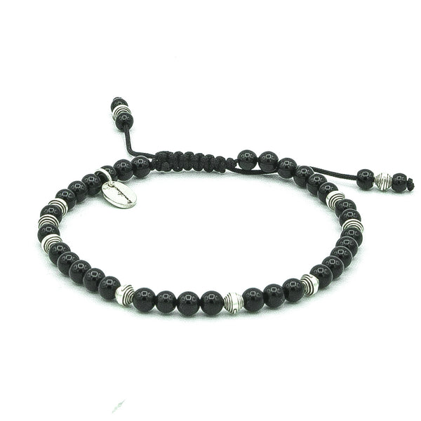 Mantra Noir – onyx brillant & argent toupie sculpté